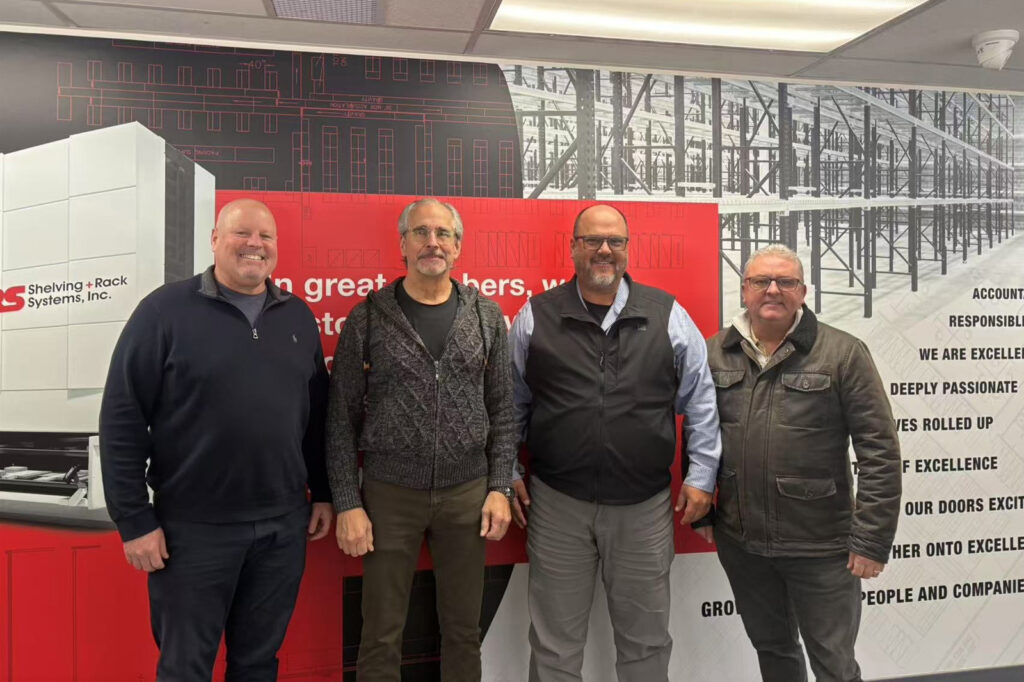 Team photo announcing Shelving + Rack Systems joining the Rainbow Dynamics distributor network